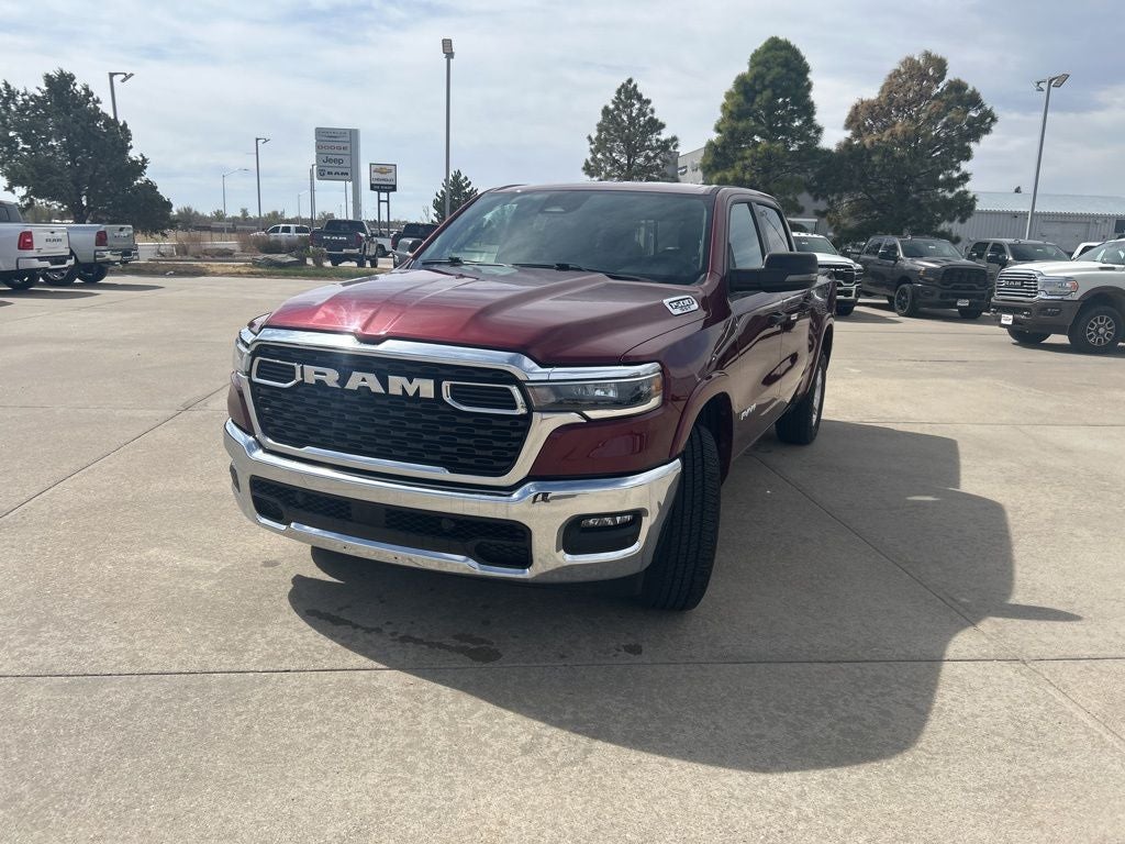 2025 RAM 1500 Big Horn/Lone Star in Delmonico Red Pearlcoat — front three-quarter view