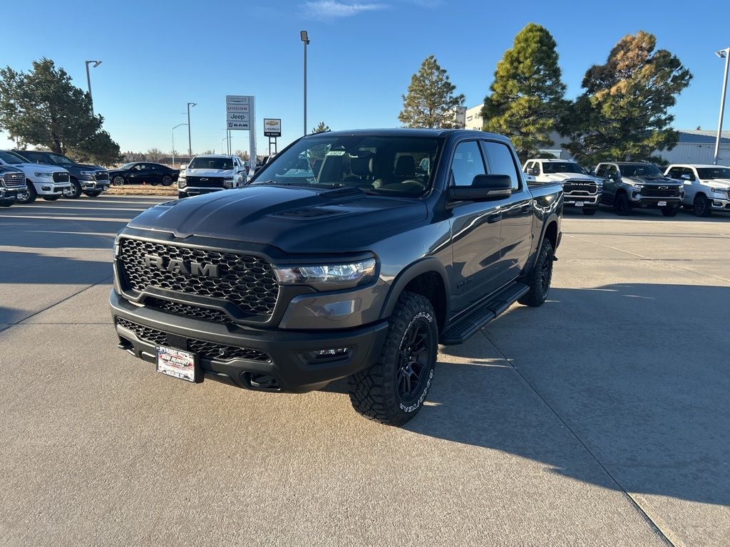 2026 RAM 1500 Rebel in Granite Crystal Metallic Clear-Coat Exterior Paint — front three-quarter view