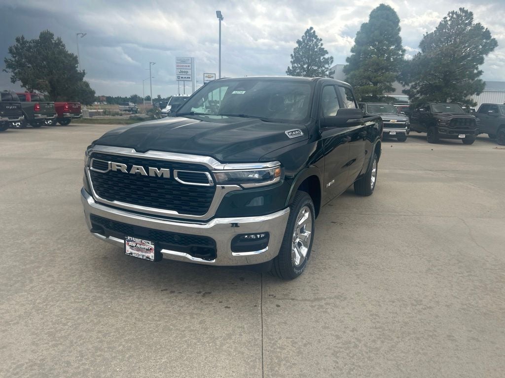 2026 RAM 1500 Big Horn/Lone Star in Serrano-Green Metallic Exterior Paint — front three-quarter view