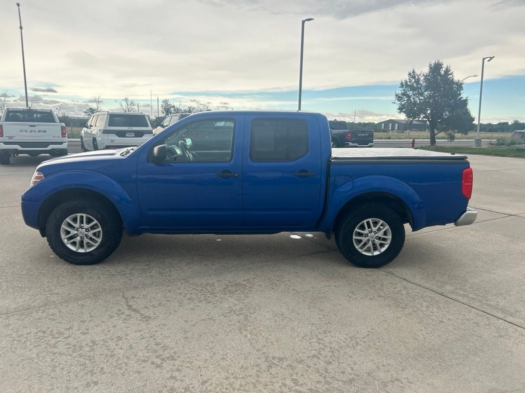 2014 Nissan Frontier — side profile view