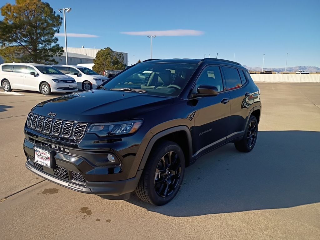 2026 Jeep Compass Latitude in Diamond Black Crystal Pearl-Coat Exterior Paint — front three-quarter view