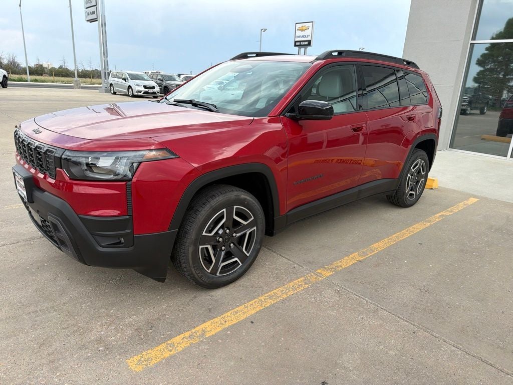 2026 Jeep Cherokee Limited in Red Hot Pearl-Coat Exterior Paint — front three-quarter view