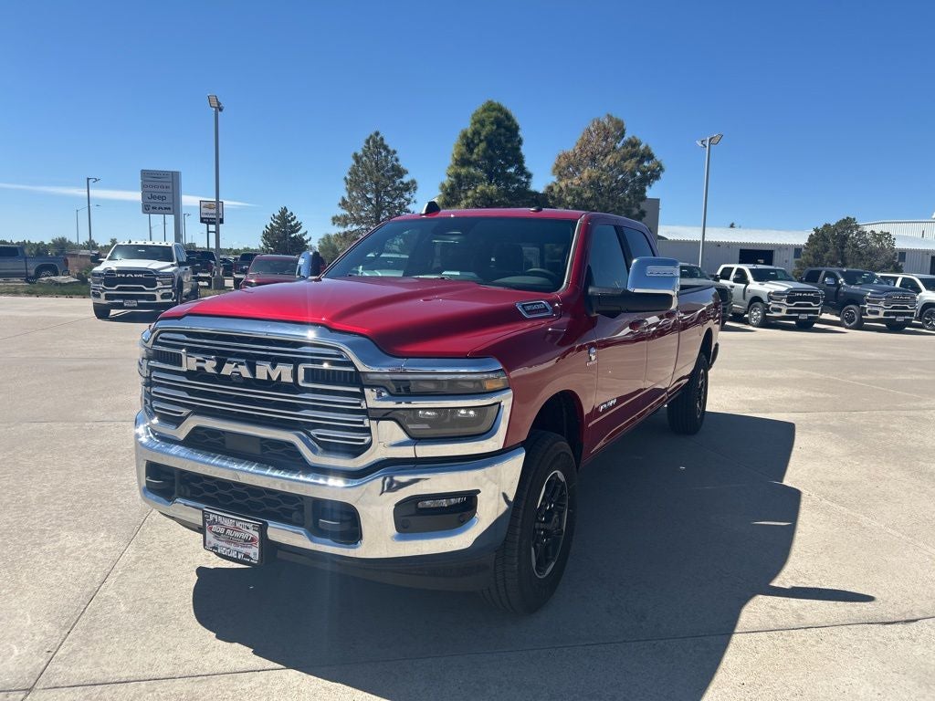 2026 RAM 3500 Laramie in Molten Red Pearl-Coat Exterior Paint — front three-quarter view