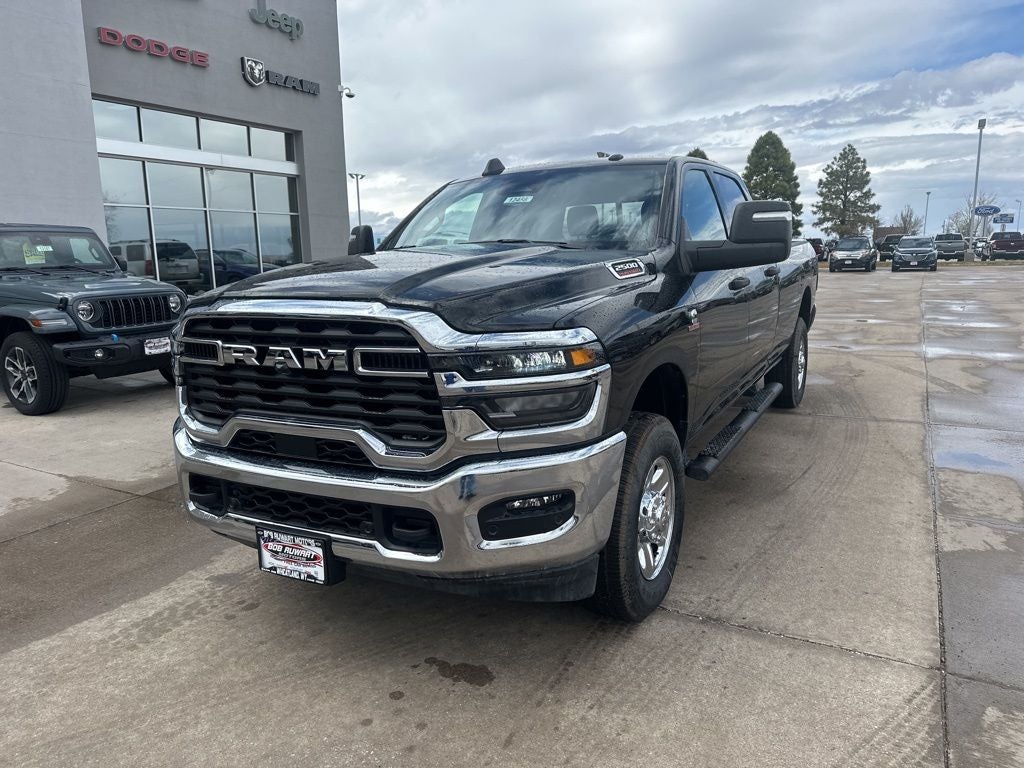 2025 RAM 2500 Tradesman in Diamond Black Crystal Pearl-Coat Exterior Paint — front three-quarter view