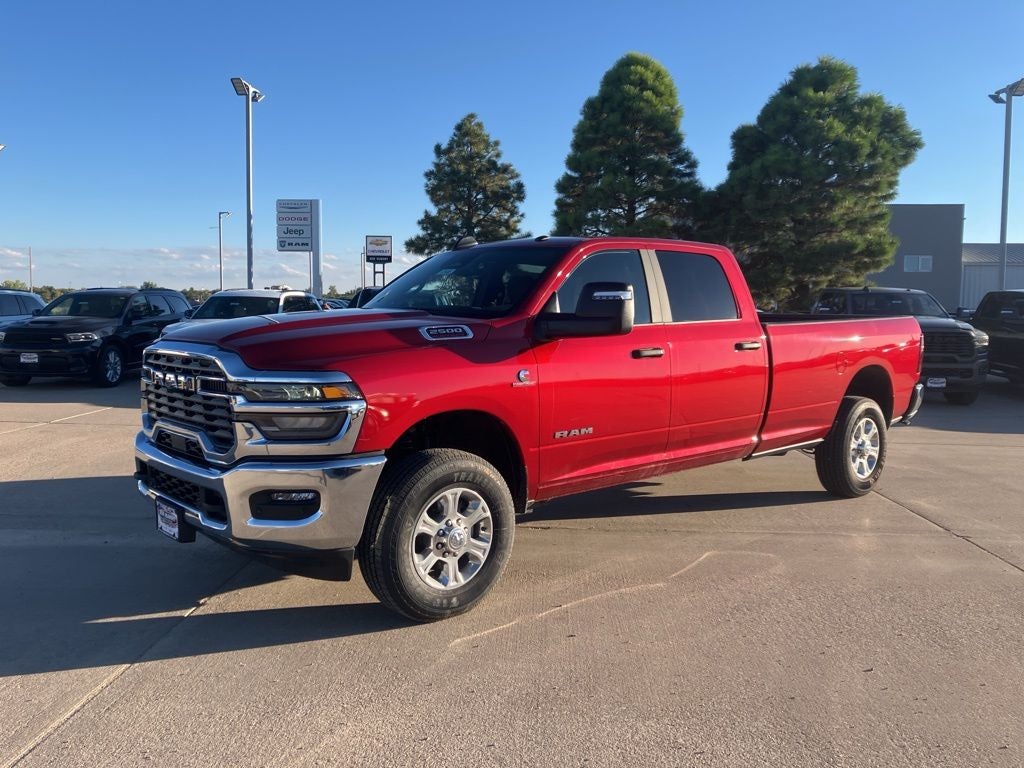 2026 RAM 2500 Big Horn in Molten Red Pearl-Coat Exterior Paint — front three-quarter view
