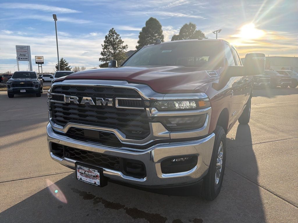 2026 RAM 2500 Big Horn in Molten Red Pearl-Coat Exterior Paint — front three-quarter view